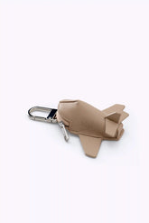 The Airplane Charm in Beige